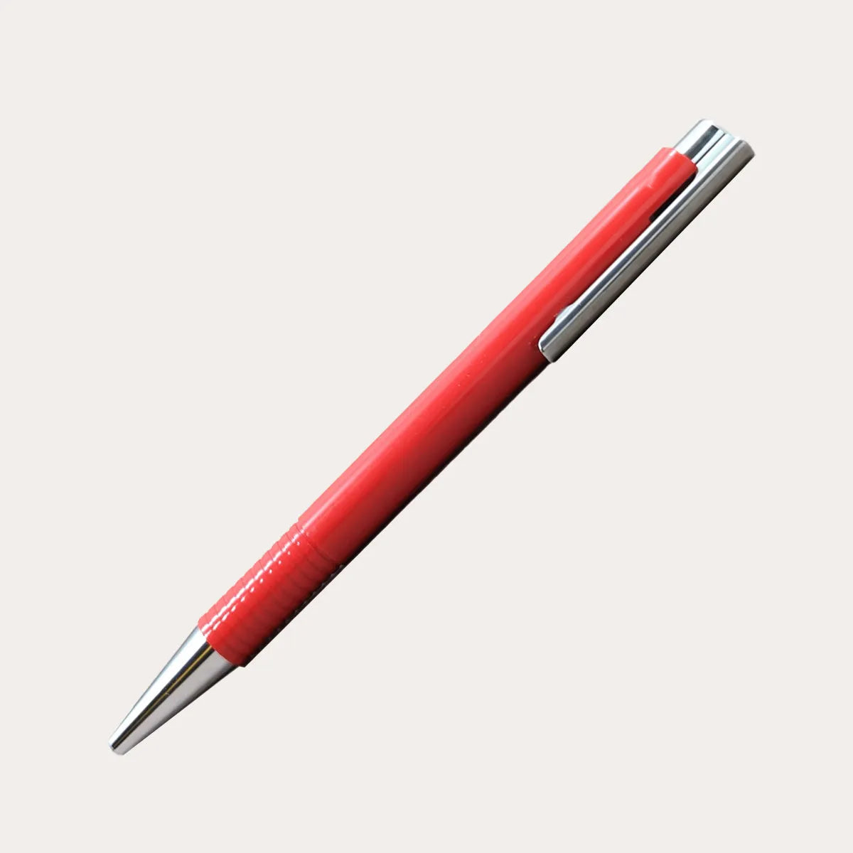 Portable black cylindrical pen