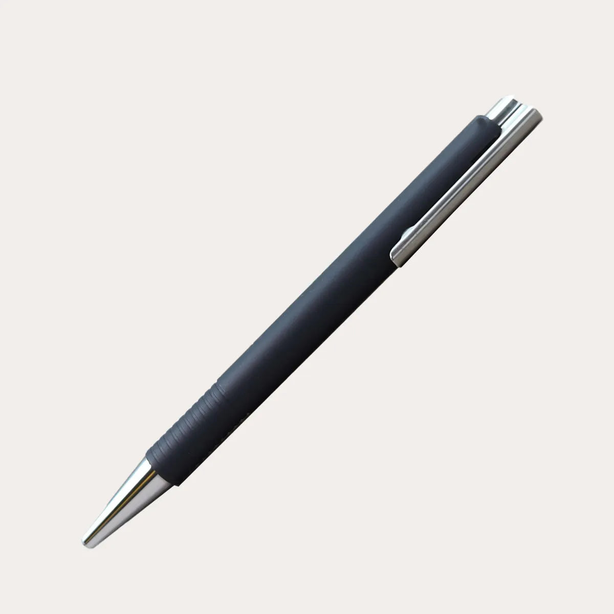 Portable black cylindrical pen